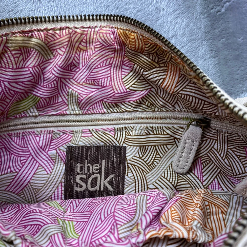 The Sak Pale Pink Leather Crossbody Bag Flap Zip Pockets Adjustable Strap‎